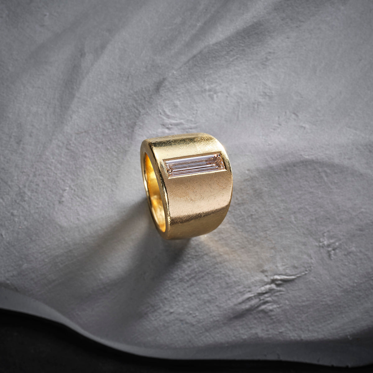 18ct gold and baguette cut flawless champagne diamond ring.